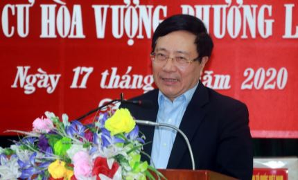 M. Pham Binh Minh à la fête de grande union nationale à Hoa Vuong (Nam Dinh)