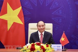 Le président Nguyen Xuan Phuc prononce un discours lors du Sommet sur le climat